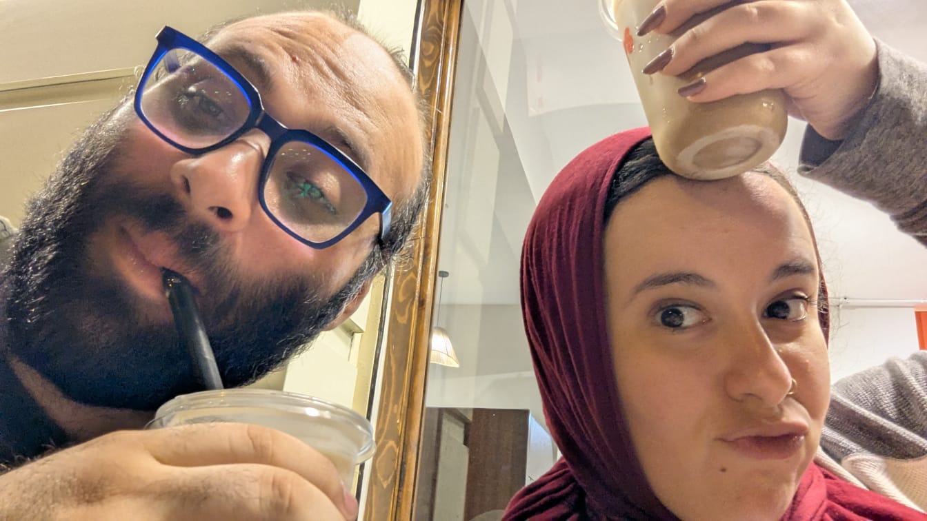 Ziad and Jessy sharing a playful coffee moment
